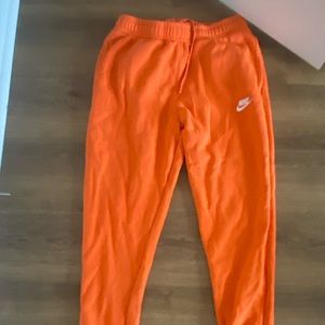 Orange Nike sweats